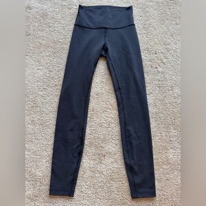 Lululemon women’s black yoga pants, size 4, barely worn.